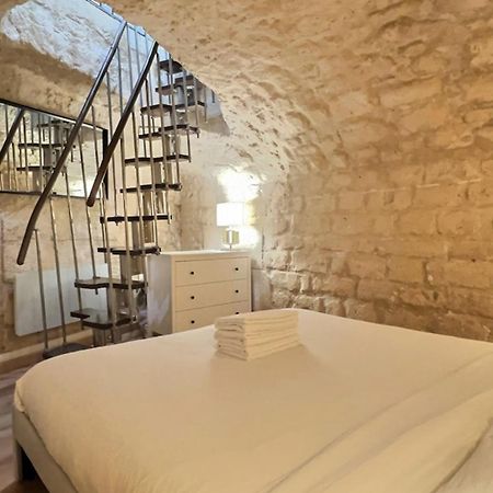 Ideally Located And Atypical Apartment In París Exterior foto